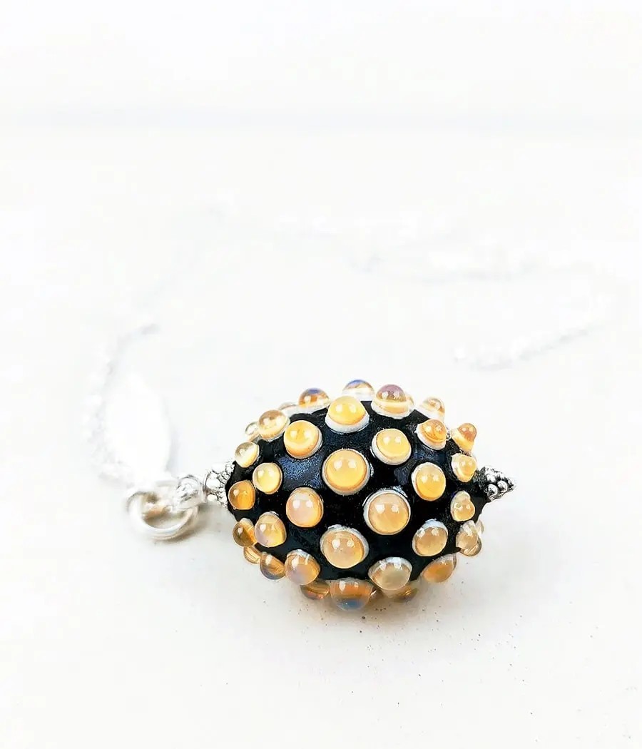 Pendentif sautoir à pois...
